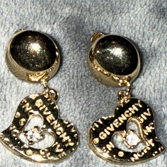 Preloved Givenchy post op earrings gold with rhinestone has stamp.